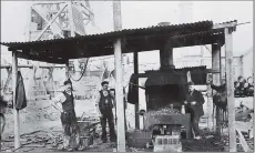  ?? ?? IRON MEN AT WORK: Bullcroft Colliery blacksmith­s pose for a photograph; The Moon Inn on its original site, with Arthur Thurman as landlord; the Carcroft Club, which was built in 1914, on the right.