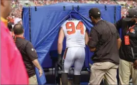  ?? ASSOCIATED PRESS FILE PHOTO ?? Browns defensive end Carl Nassib enters a pop-up medical tent on the sideline in a National Football League game against the New York Jets in Cleveland on Oct. 8.