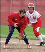  ?? ?? Ava Macklin, pictured leading off from first base earlier this season, had two hits and the Jets beat Monroe Central 17-1 Tuesday.