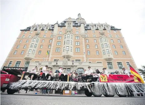  ?? KAYLE NEIS ?? The Concordia Brass band performs during this year’s Ex parade held Tuesday in downtown Saskatoon.