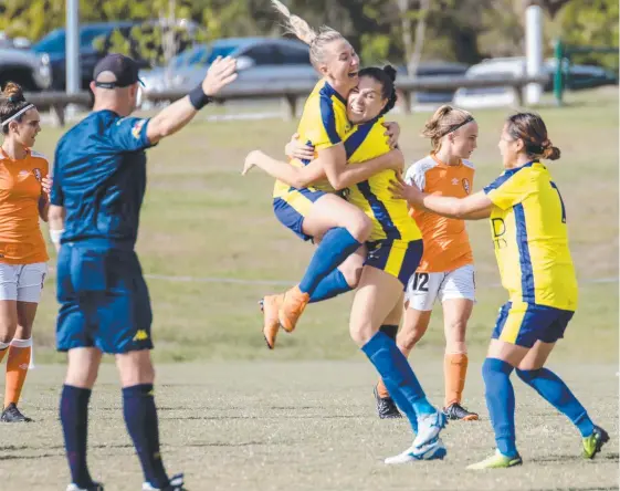  ?? Picture: AGM PHOTOGRAPH­ER ?? Gold Coast United's Deeanna Thompson (left) celebrates with Ellie Fryer after her goal against Brisbane Roar.