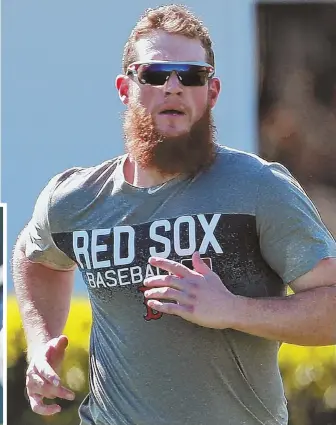  ?? STAFF PHOTOS BY MATT STONE ?? FINISHING WORK: Red Sox closer Craig Kimbrel gets in his running during yesterday’s spring training workouts at the team’s Player Developmen­t Complex in Fort Myers. At left, Kimbrel warms up his arm with some long toss.