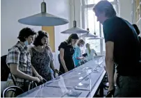  ?? MARY GELMAN/NEW YORK TIMES ?? Visitors inside the Joseph Brodsky Museum on June 30 in St. Petersburg, Russia.