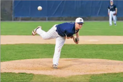  ?? THOMAS NASH - DIGITAL FIRST MEDIA ?? Spring-Ford’s Jake Skrocki delivers to the plate during Monday’s game against Phoenixvil­le. Skrocki pitched the complete game as the Phantoms won, 2-1.