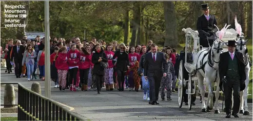  ??  ?? Respects: Mourners follow the hearse yesterday