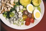  ??  ?? The Buttery Corner Cafe makes good Cobb salad with still-warm chunks of chicken.