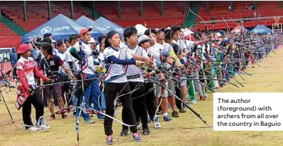  ??  ?? The author (foreground) with archers from all over the country in Baguio