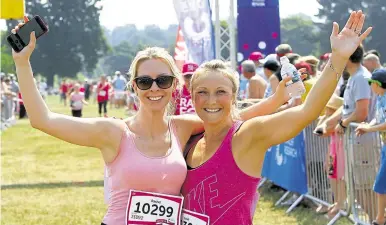  ??  ?? Celebratio­ns at the finish line at Maidstone’s Race For Life