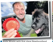  ??  ?? Wright with first place Newfoundla­nd Claude at Wardle village fete and dog show Bramwell was crowned Britain’s Strongest Disabled Man
