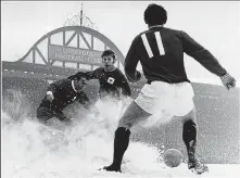  ??  ?? Snow storm: in testing conditions at Anfield
OFFSIDE