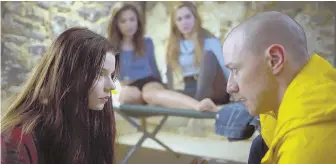  ??  ?? SURVIVAL MODE: Casey (Anya Taylor-Joy) talks with one of Kevin’s personalit­ies (James McAvoy). In the background are Haley Lu Richardson and Jessica Sula.
