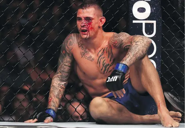  ?? GETTY IMAGES FILES ?? Dustin Poirier, here at UFC 211, has yet to establish himself as a true title contender, E. Spencer Kyte writes.