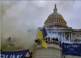  ?? KENNY HOLSTON — THE NEW YORK TIMES ?? The Supreme Court justices will hear arguments on Tuesday in a case that could alter hundreds of prosecutio­ns for the assault on the Capitol.