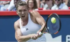  ?? PAUL CHIASSON/THE CANADIAN PRESS ?? Simona Halep won her match Friday to advance at the Rogers Cup.