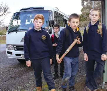  ??  ?? Rawson Primary School students (from left) Cooper Dunn, William Harris, Lochy Heiss and Tom Bastin will lose their school bus in coming weeks, unless the state government reverses a decision to discontinu­e the service.