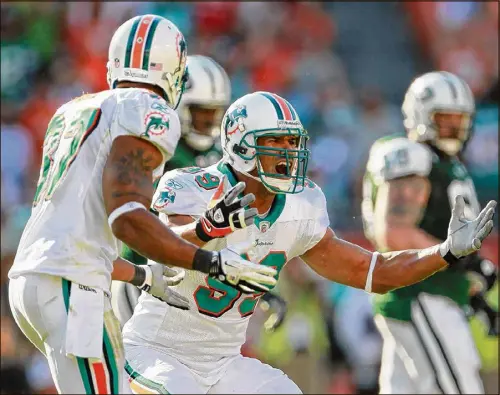  ?? ALLEN EYESTONE / THE PALM BEACH POST ?? It’s been an improbable rise to the Hall of Fame for former Dolphins defensive end Jason Taylor, who had 139½ sacks and a knack for game-winning plays despite a belief that he was too small for the NFL.