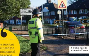  ?? ?? A PCSO next to a taped-off area