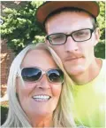  ??  ?? Berthena Vance of Independen­ce, Ky., kisses son Brandon Greene’s urn every morning. He died June 26 from a probable overdose.
LIZ DUFOUR/THE CINCINNATI ENQUIRER