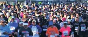  ??  ?? FOOD-WALKING: Thousands of people took part in charity walk Blisters for Bread from Green Point Stadium yesterday.