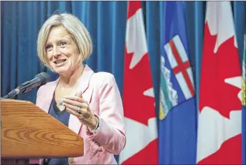  ?? CP FILE PHOTO ?? Alberta Premier Rachel Notley, squaring off with her arch pipeline foe, is comparing Trans Mountain pipeline protesters to dewey-eyed unicorn jockeys from Salt Spring Island. Notley discusses pipeline expansion with reporters in Calgary, last month.
