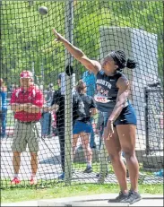  ?? GARY FOURNIER / SENTINEL & ENTERPRISE FILE ?? North Middlesex’s Martina Nkwantah competes in the shot put last year at Fitchburg State.