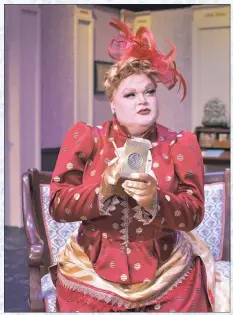  ?? ?? Lady Blackwell (played by D’Manda Martini) sips a cup of tea in a scene from Port Tobacco Players’ “The Importance of Being Earnest.”