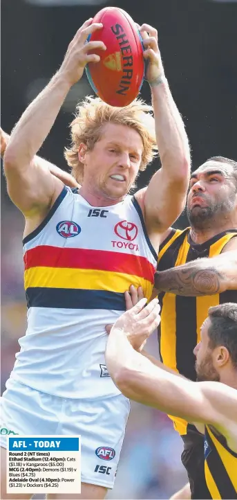  ?? Picture: GETTY IMAGES ?? Rory Sloane of the Crows marks in front of Hawthorn’s Shaun Burgoyne in their Round 2 AFL clash at the MCG yesterday. Sloane was one of the stars for Adelaide