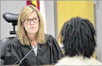  ?? LAURA
SKELDING / AMERICANST­ATESMAN 2014 ?? State District Judge Julie Kocurek, who handles cases such as murder, sexual assault and major drug crimes, was injured Friday night when a shooter fired into her car at the gate of her home, officials said.