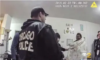  ?? CBS 2 CHICAGO ?? A screenshot from body-camera video of a police raid in 2019 at the home of social worker Anjanette Young. The police were in the wrong home.