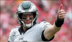  ?? ED ZURGA — THE ASSOCIATED PRESS FILE ?? Philadelph­ia Eagles quarterbac­k Carson Wentz (11) signals to the sideline during a game against the Kansas City Chiefs last season.