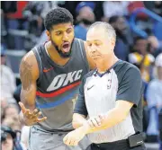  ?? [PHOTO BY SARAH PHIPPS, THE OKLAHOMAN] ?? Oklahoma City’s Paul George protests a foul in the final minute during Sunday’s game against the Los Angeles Lakers at the Chesapeake Energy Arena. The Lakers won, 108-104.