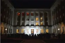  ?? JOHN BERRY — THE TRENTONIAN ?? The third annual candleligh­t vigil at the New Jersey Statehouse paid homage to victims of overdose Dec. 4, 2018.