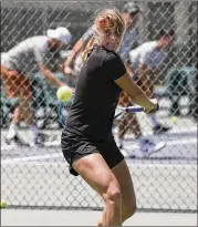  ??  ?? The Longhorns’ Bianca Turati, a freshman from Italy, practices last week at the Whitaker tennis facility while Texas’ new facilities are being built.