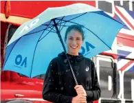  ?? Reuters ?? Johanna Konta holds an umbrella as she stands in the rain during an official event ahead of the Australian Open. —