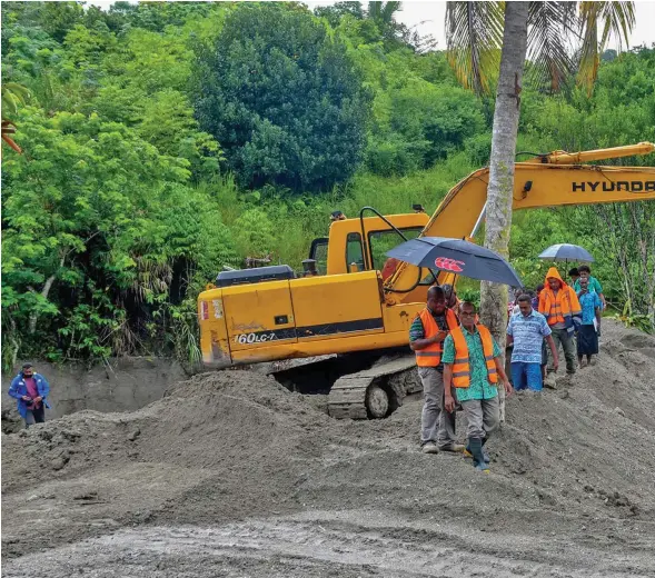  ??  ?? Minister for Infrastruc­ture, Transport, Disaster Management and Meteorolog­ical Services, Jone Usamate witnessed firsthand the damge done by the landslide on February 18, 2019.