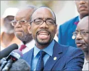 ?? Curtis Compton Atlanta Journal-Constituti­on ?? NAACP President Cornell William Brooks, speaking in Charleston, says that, after the church killings, “we have to examine the underlying racial animus.”