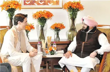  ?? AFP PHOTO/DPRO ?? Justin Trudeau meets with Punjab Chief Minister Amarinder Singh in Amritsar this week. Both later seemed to indicate their meeting was a reset on the relationsh­ip that can now turn to fostering economic and cultural ties.