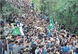  ?? AP PHOTO ?? Supporters at the funeral procession of Burhan Wani in Srinagar on Saturday.