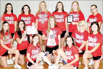  ?? PHOTO BY RICK PECK ?? The McDonald County High School varsity cheerleade­rs received several awards at a camp held this summer at Springdale High School. Pictured, from left, are: Front row: Brookelynn Cooper, Madison Smith and Hannah Huber. Middle row: Caitlynn Stouder,...