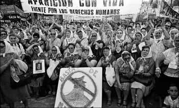  ??  ?? Top: army troops loyal to the country’s hardline military junta were constantly on patrol at all public gatherings in Argentina Centre: the Navy Petty-Officers School of Mechanics, a secret detention centre in Buenos Aires, where more than 4,850 died Bottom: Las Madres de Plaza de Mayo, aka ‘Mothers of the Disappeare­d’, have sought justice for kidnapped children since 1977