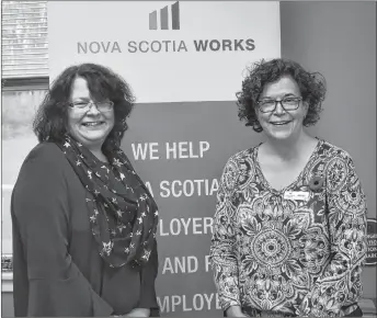  ?? ADAM MACINNIS/THE NEWS ?? Heather MacIsaac, left, and Amanda White work at the Nova Scotia Works Employment Service Centre in New Glasgow. They say things are looking up in the job market in Pictou County.