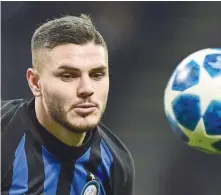  ?? — AFP ?? Inter Milan’s Argentine forward Mauro Icardi goes for the ball against PSV Eindhoven at the San Siro Stadium in Milan.