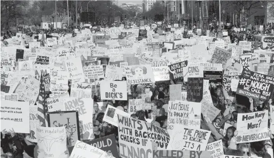  ?? OLIVIER DOULIERY, ABACA PRESS, TNS ?? Thousands of protesters in Washington, D.C., attend a March For Our Lives rally to demand stricter U.S. gun-control laws.