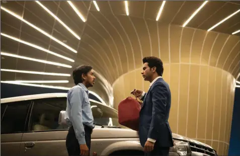  ??  ?? Low caste driver Balram (Adarsh Gourav) sees it as his duty and destiny to be a faithful servant to his boss’ son, the Western-educated Ashok (Rajkummar Rao) in Ramin Bahrani’s powerful “The White Tiger.”