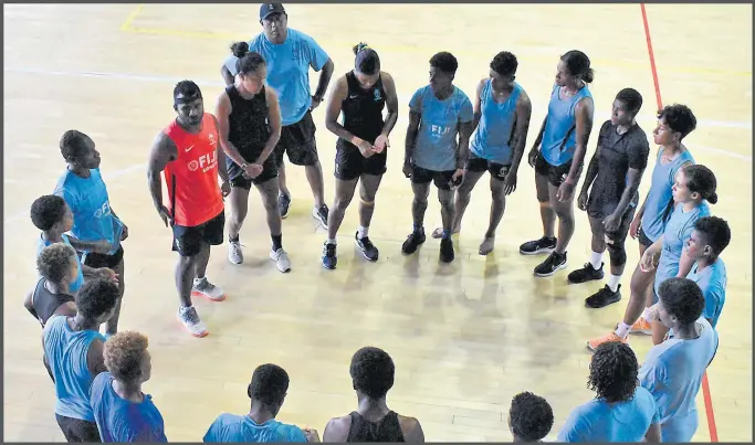  ?? Picture: ATU RASEA ?? Fijiana 7s assistant coach Jerry Tuwai, in a pink vest, talks to members of team during a training session at the Vodafone Arena in Suva yesterday.