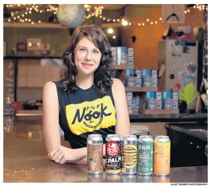  ?? JULIET ROMEO PHOTOGRAPH­Y ?? Mary McGinn, co-owner of the Nook on Robinson in the Milk District, has tasty local picks for your craft-beer cooler this weekend.