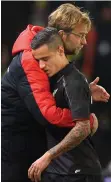  ??  ?? Bad luck: Klopp consoles the injured Coutinho