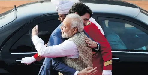  ?? SEAN KILPATRICK / THE CANADIAN PRESS FILES ?? Prime Minister Justin Trudeau is greeted by Prime Minister of India Narendra Modi in New Delhi on Friday.