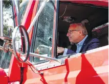  ?? MATHIEU BELANGER/THE CANADIAN PRESS ?? Parti Québécois Leader Jean-Francois Lisée drives a fire truck during Limoilou en Fete, Sunday in Quebec City. Lisée has appeared frustrated that questions about Mercier candidate Michelle Blanc have overshadow­ed the PQ’s environmen­tal program.