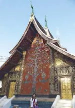  ??  ?? The Wat Xieng Thong, a richlydeco­rated 16th- century pagoda in Luang Prabang.